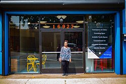 Denise Moore stands in front of ZAB Cultural Collective, her new art gallery and coworking space in East English Village.