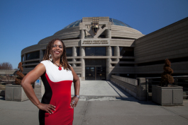 Satori Shakoor in front of the Charles H. Wright Museum of African American History