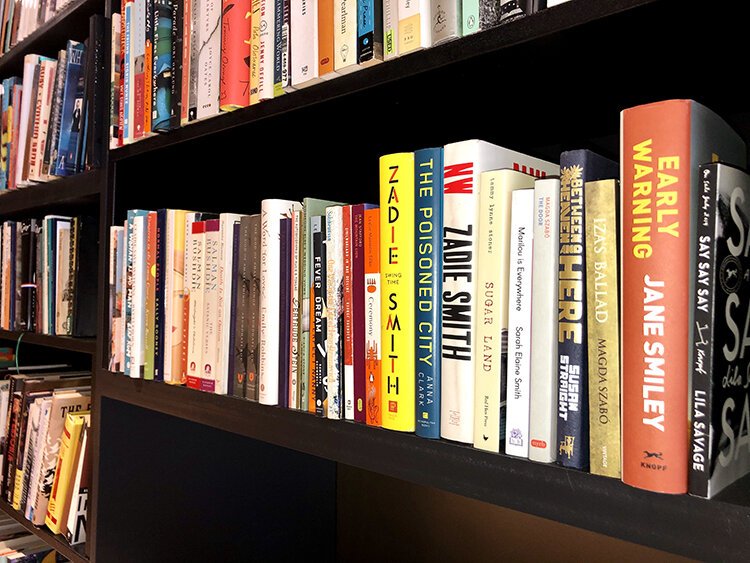 A shelf of books at Room Project in New Center.