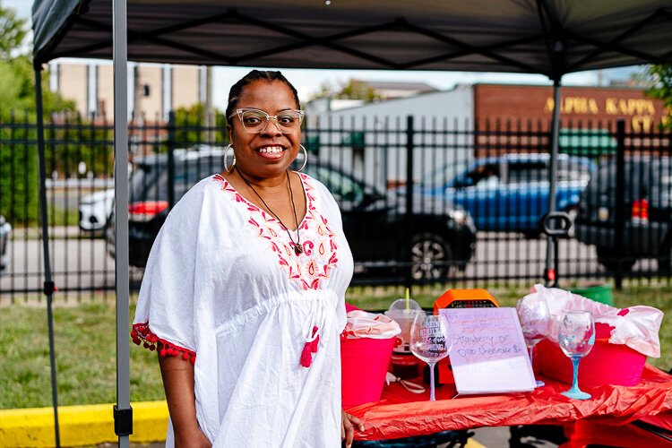 Brittany Tansil stands in front of her booth at Fantazma Market