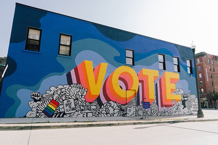 This mural by Detroit-based artist Ndubisi Okoye is one of eight murals that will be painted in six cities across Michigan. All of the murals are being created in collaboration with Detroit-based gallery and arts publisher 1xRUN and local artists to 