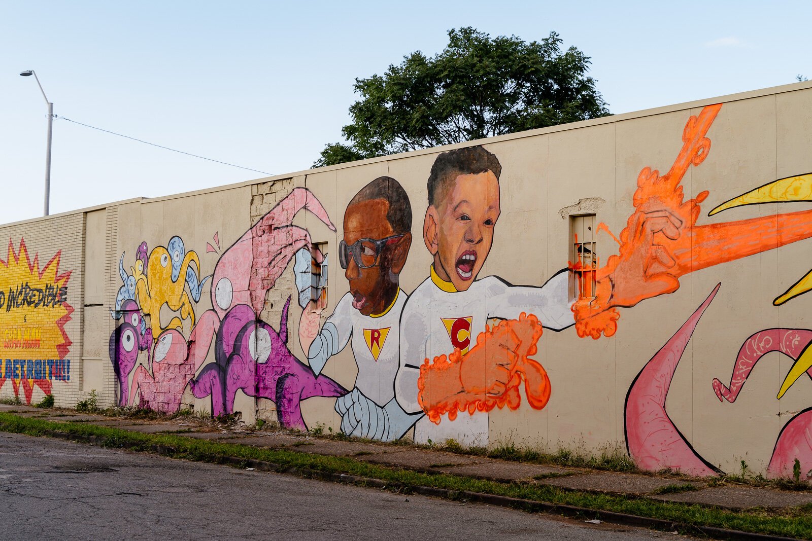 Tylonn J. Sawyer mural of his nephews fighting aliens off E Grand Blvd on St. Antoine