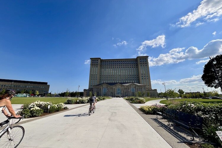 Bikers headed for Michigan Central. Now restored, the train station had been a symbol of Detroit blight since 1988. 