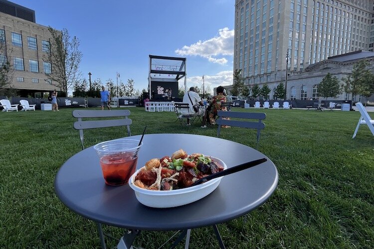 The author enjoys an old fashion, Creole bowl and live R'n'B. Food and drink trucks, and live music keep the Michigan Central grand opening going on weekends.