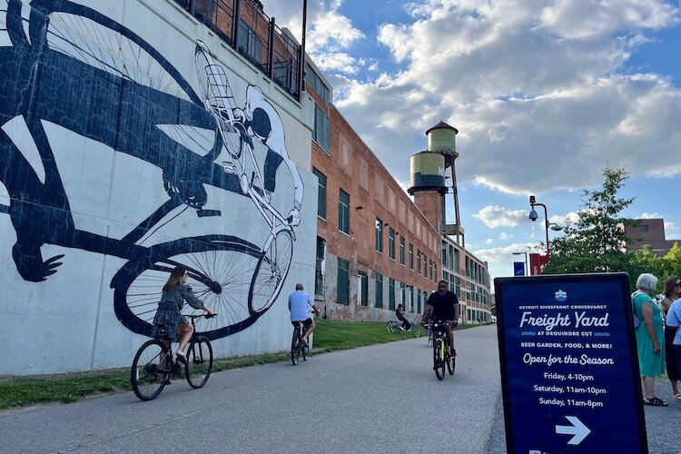 The Dequindre Cut pathway has spaces for public gatherings, such as the Freight Yard beer garden.