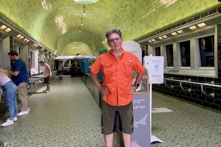 Author Mark Wedel after getting caught sneaking a peak in the exit door of the Belle Isle Aquarium, just after closing time.