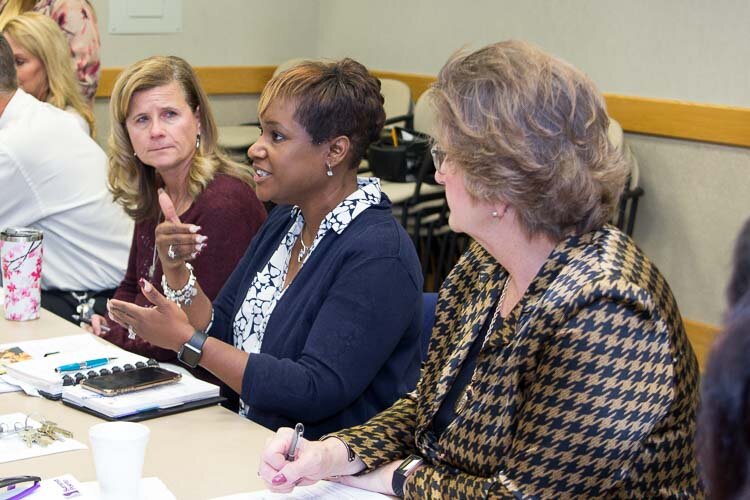 Michigan Department of Education partnership agreement liaison Lisa Francisco; Battle Creek Public Schools superintendent Kim Carter; and Battle Creek Community Foundation president and CEO Brenda Hunt at a Bearcat Meeting.