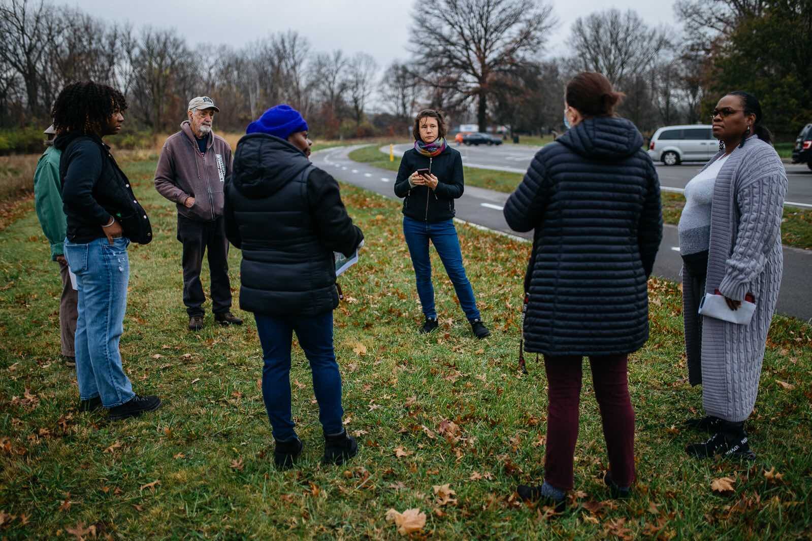 In center, Nicky Marcot, Eliza Howell Park Strategist for Sidewalk Detroit, meets with Advisory Committee members