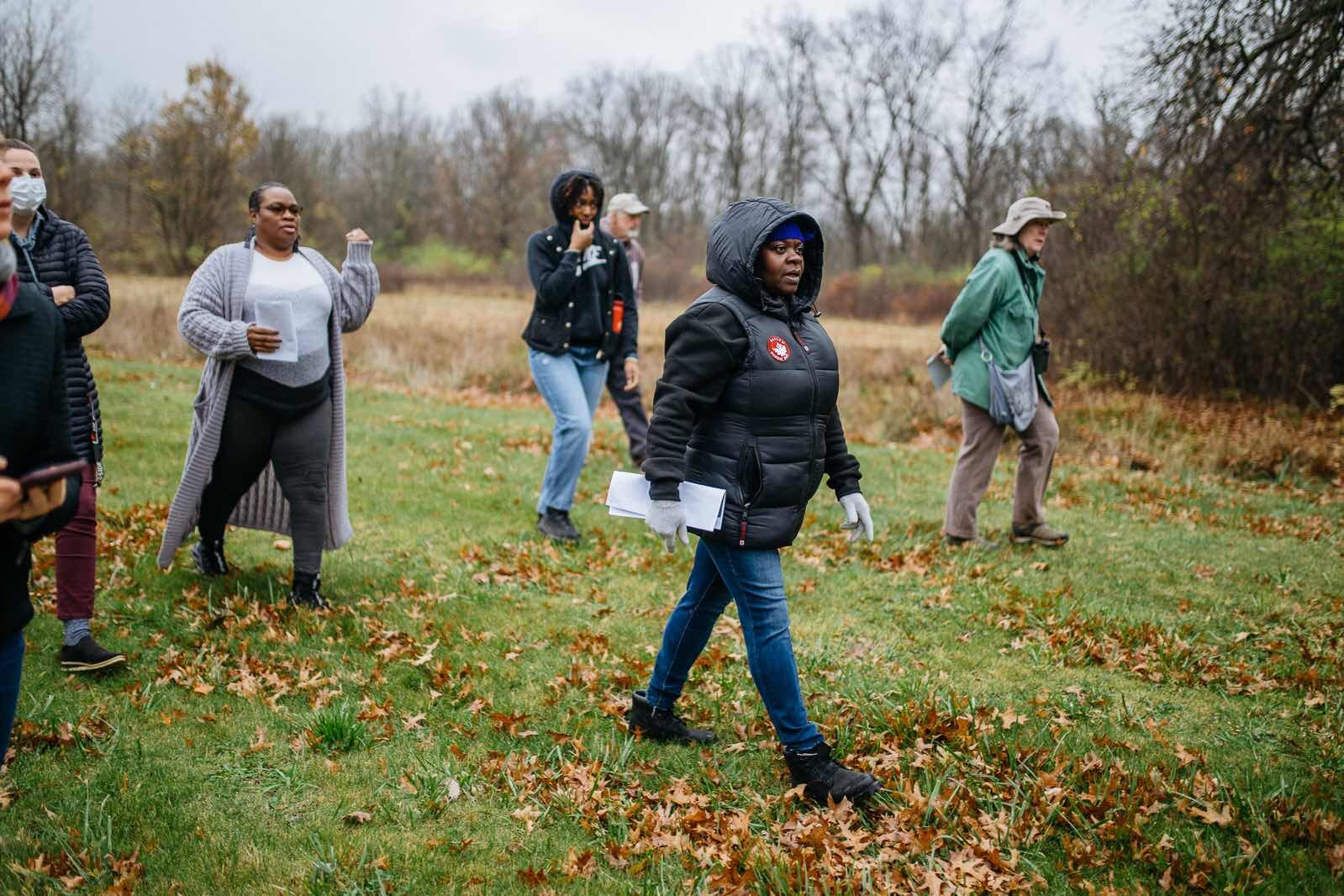 Members of the Eliza Howell Park Advisory Committee surveying for locations for benches